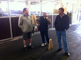 David Russo and Steve Allam talking to John at the stables