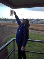 Flemington Thurs Mark Kavanagh collecting rainwater for his coffee. Times are tough