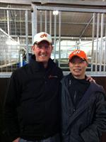 Michael at the stables with Chris So (HK Assistant trainer)