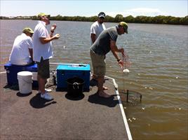 Reeling in the first crab pot