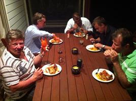 Ron showing off the days catch of Mud Crabs while the boys get into it