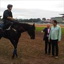 Simon and Horace keeping an eye on their horse Dao Dao