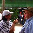 John talks with Les Tinkler at the sales John talks with Les Tinkler at the sales