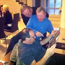 Afternoon at the Hawkes' - Kevin , John and Michael study the form guide Afternoon at the Hawkes' - Kevin , John and Michael study the form guide